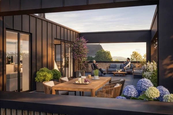Rooftop exterior rendering: metal-clad walls, outdoor dining table, lounge seating and decorative planters at sunset